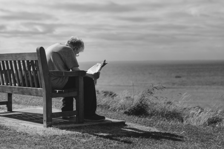 adult_beach_bench_black_and_white_cloudy_skies_grassy_lake_man-1040702.jpg!d